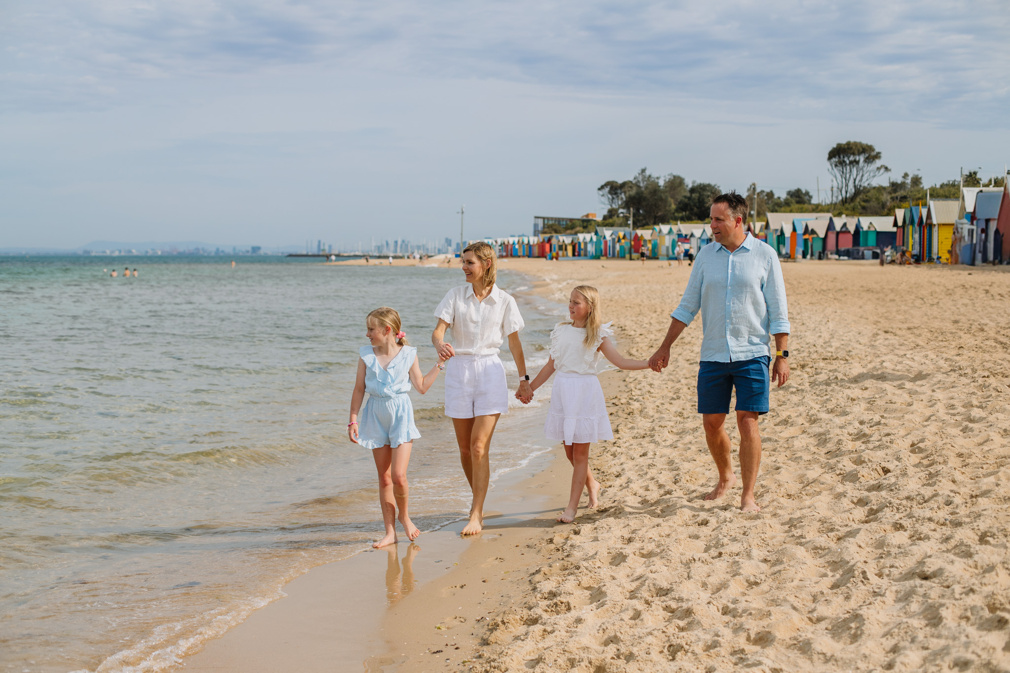 family walking on the beach photoshoot at brighton beach bayside