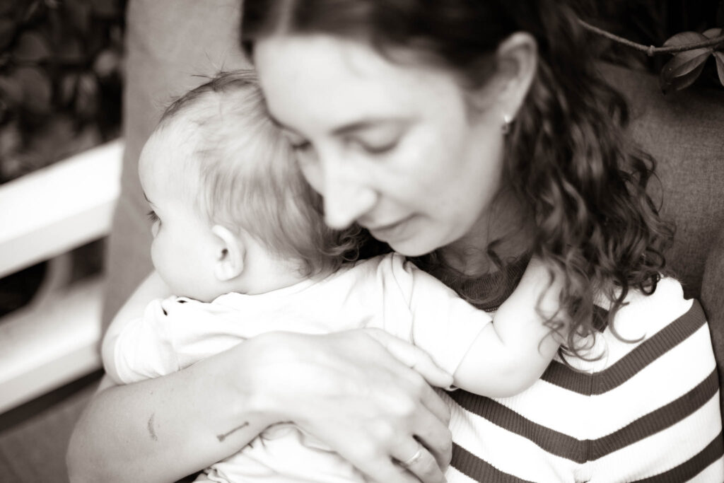 mum and baby in a hug during a photoshoot Melbourne Bayside