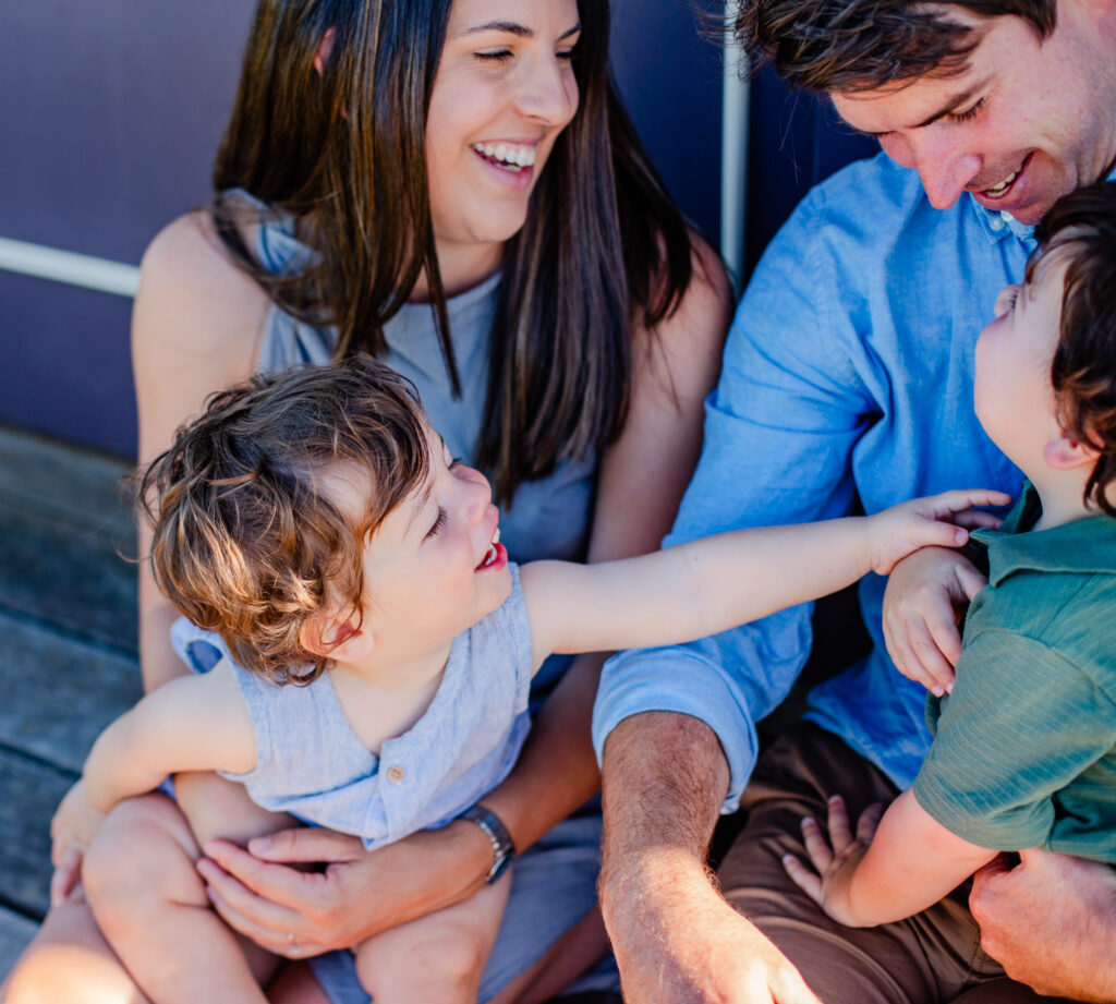 "family photoshoot capturing a moment where everyone is simply themselves, no posing, just pure authentic love."